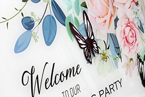 Print the butterfly in the front side of an acrylic sheet